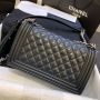 Medium Boy Chanel Handbag  in Lambskin 