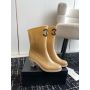 Chanel Rain Boots